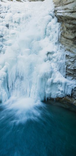 [2436x1125]瀑布 冰霜 结冰 冬季 峭壁 苹果手机壁纸图片