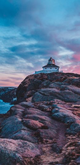 [2436x1125]灯塔 彩霞 岩石 海岸 苹果手机壁纸图片