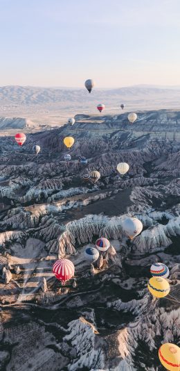 [2436x1125]热气球 地貌 俯拍 阳光 喀斯特 苹果手机壁纸图片
