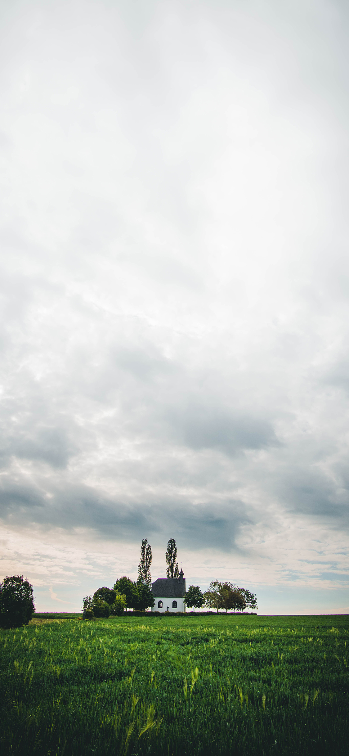 [2436×1125]田野 建筑 广阔 云彩 苹果手机壁纸图片