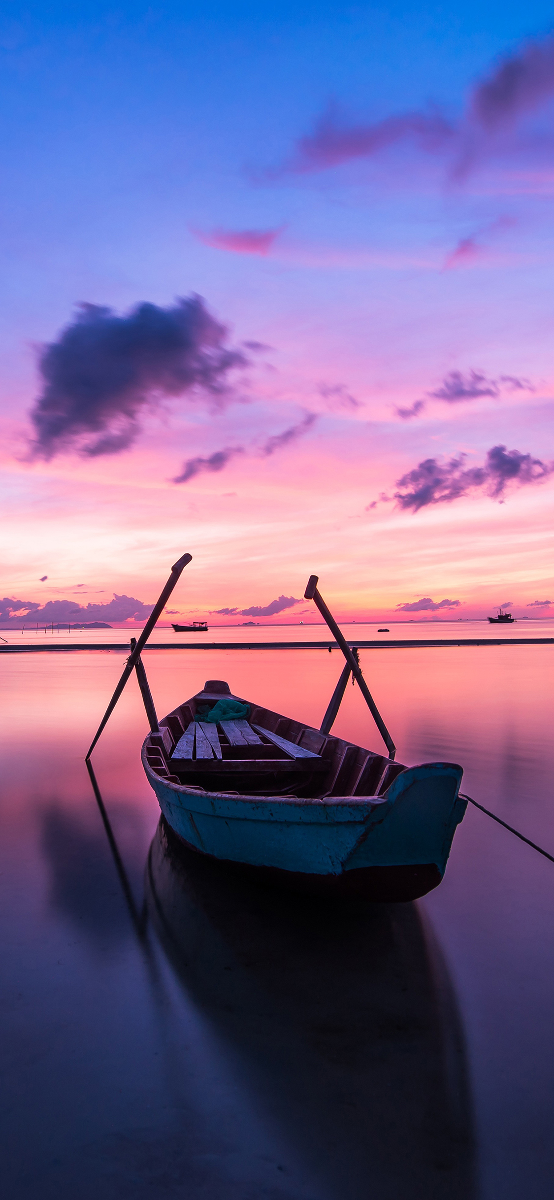 [2436×1125]船 日出 岛 旅行 云 天空 海 苹果手机壁纸图片