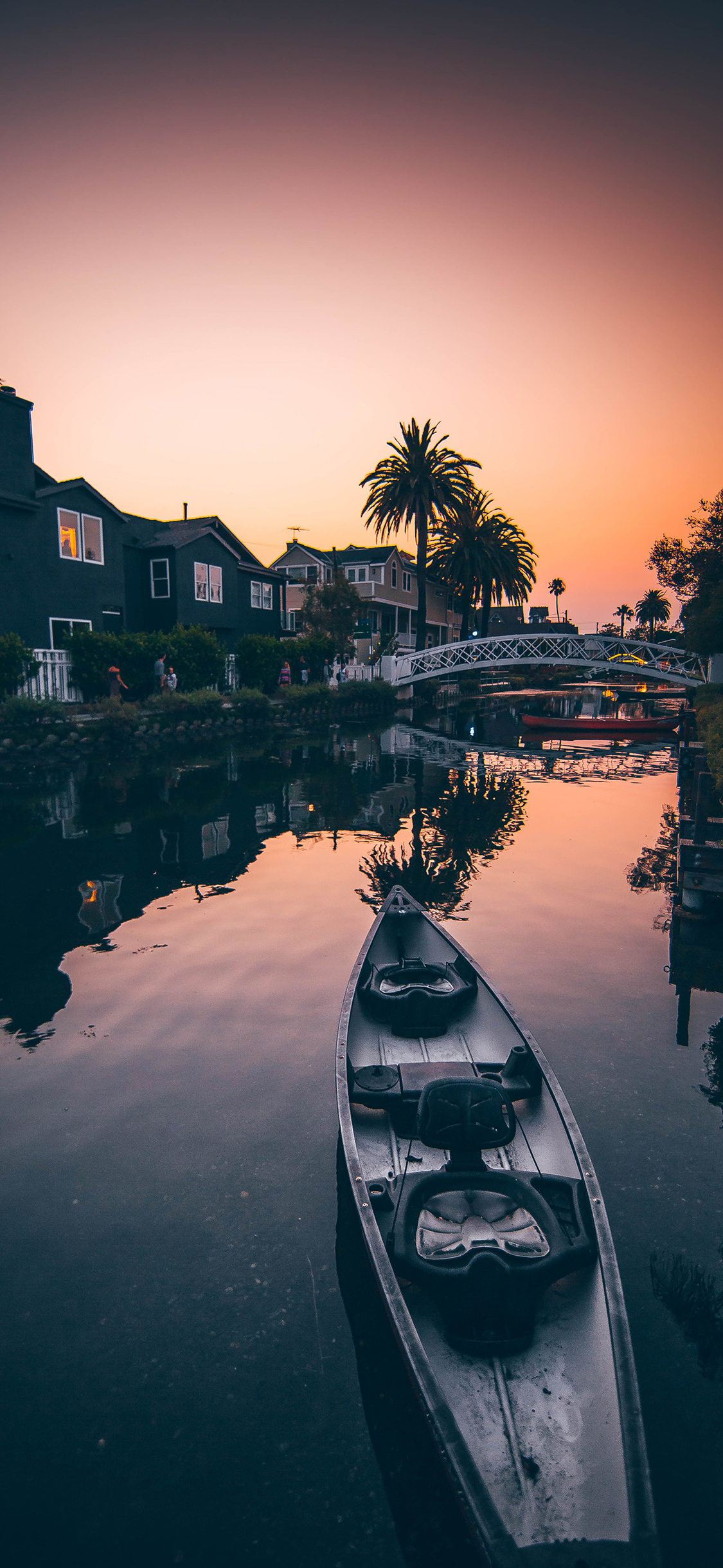 [2436×1125]船只 晚霞 河流 房屋 苹果手机壁纸图片