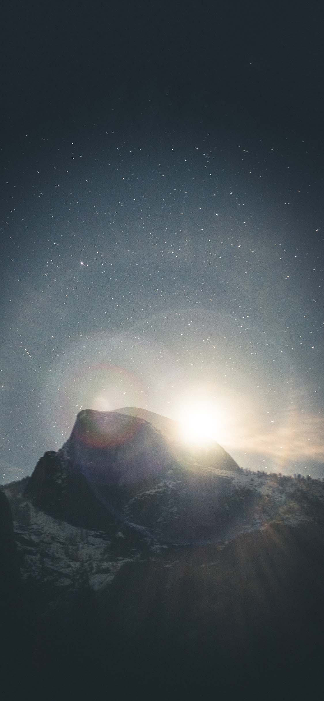 [2436×1125]郊外 自然 山峰 太阳 光晕 苹果手机壁纸图片