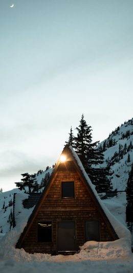 [2436x1125]雪地 小木屋 灯光 温馨 苹果手机壁纸图片