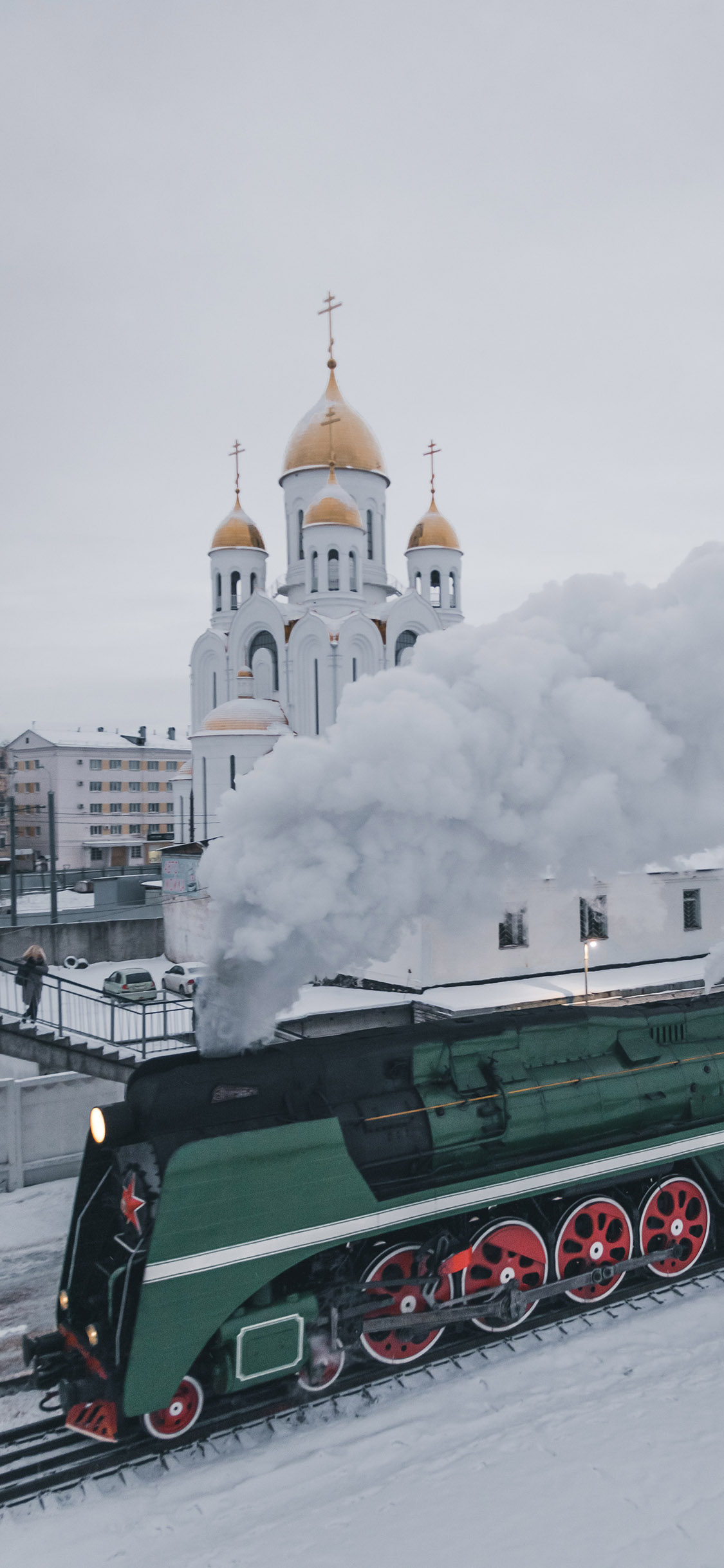 [2436×1125]雪地 建筑 堡垒 火车 烟雾 苹果手机壁纸图片