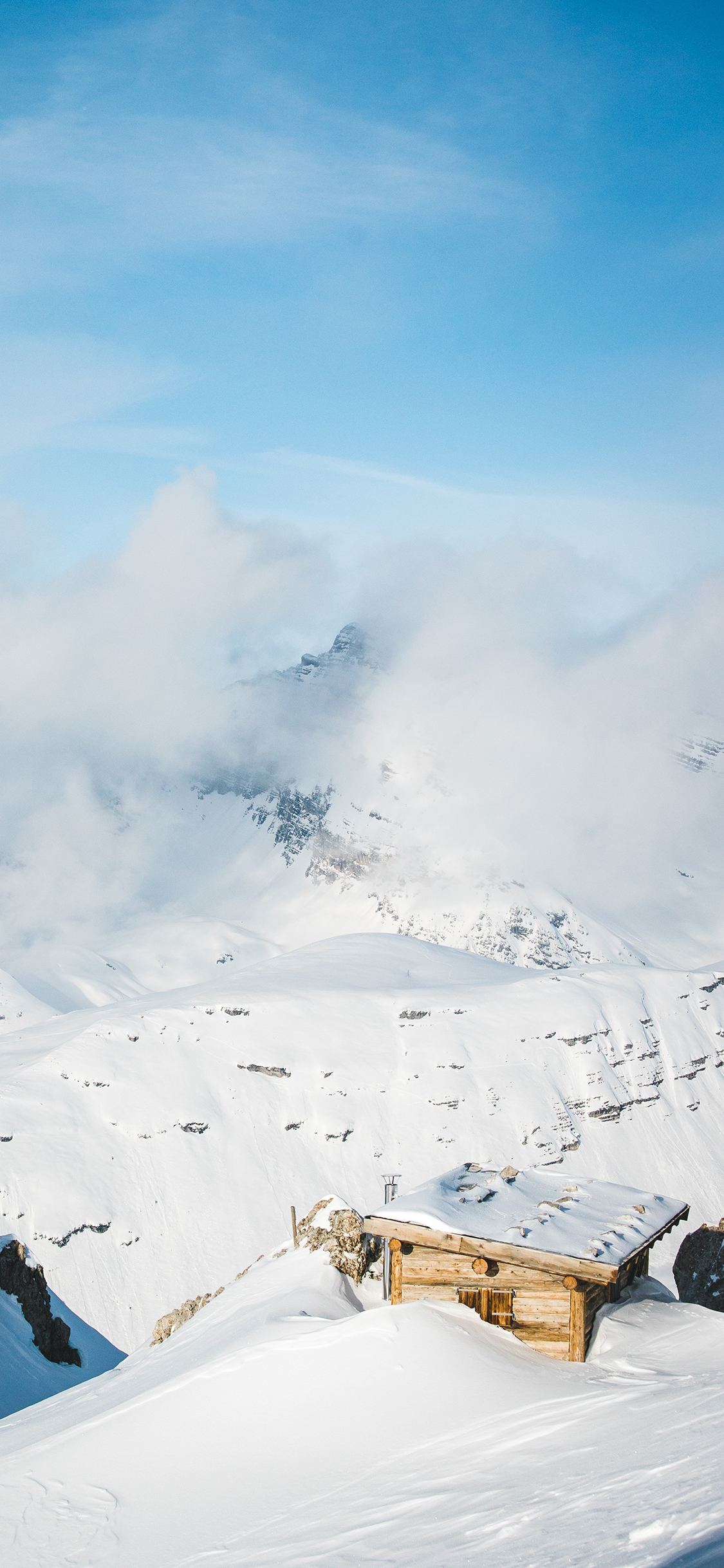 [2436×1125]雪地 白雪覆盖 小木屋 苹果手机壁纸图片
