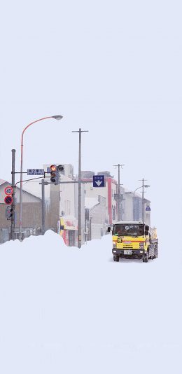 [2436x1125]雪地 车辆 行驶 城市 马路 冬季 苹果手机壁纸图片