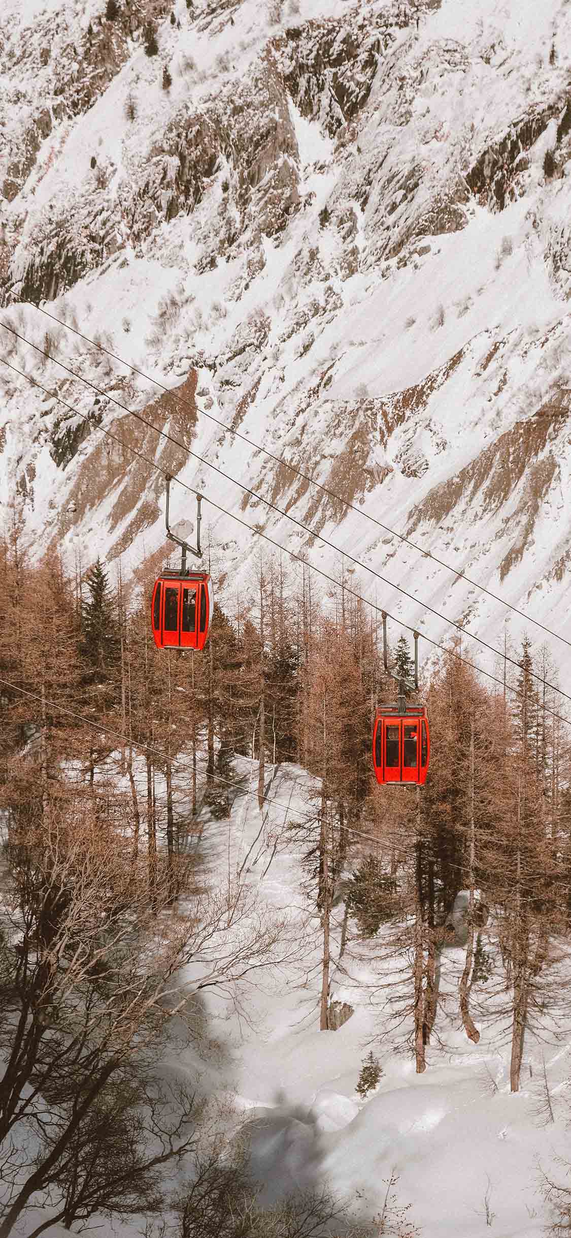 [2436×1125]雪山 山峰 林木 缆车 苹果手机壁纸图片