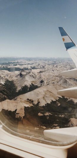 [2436x1125]雪山 山脉 飞机 窗户 航拍 苹果手机壁纸图片