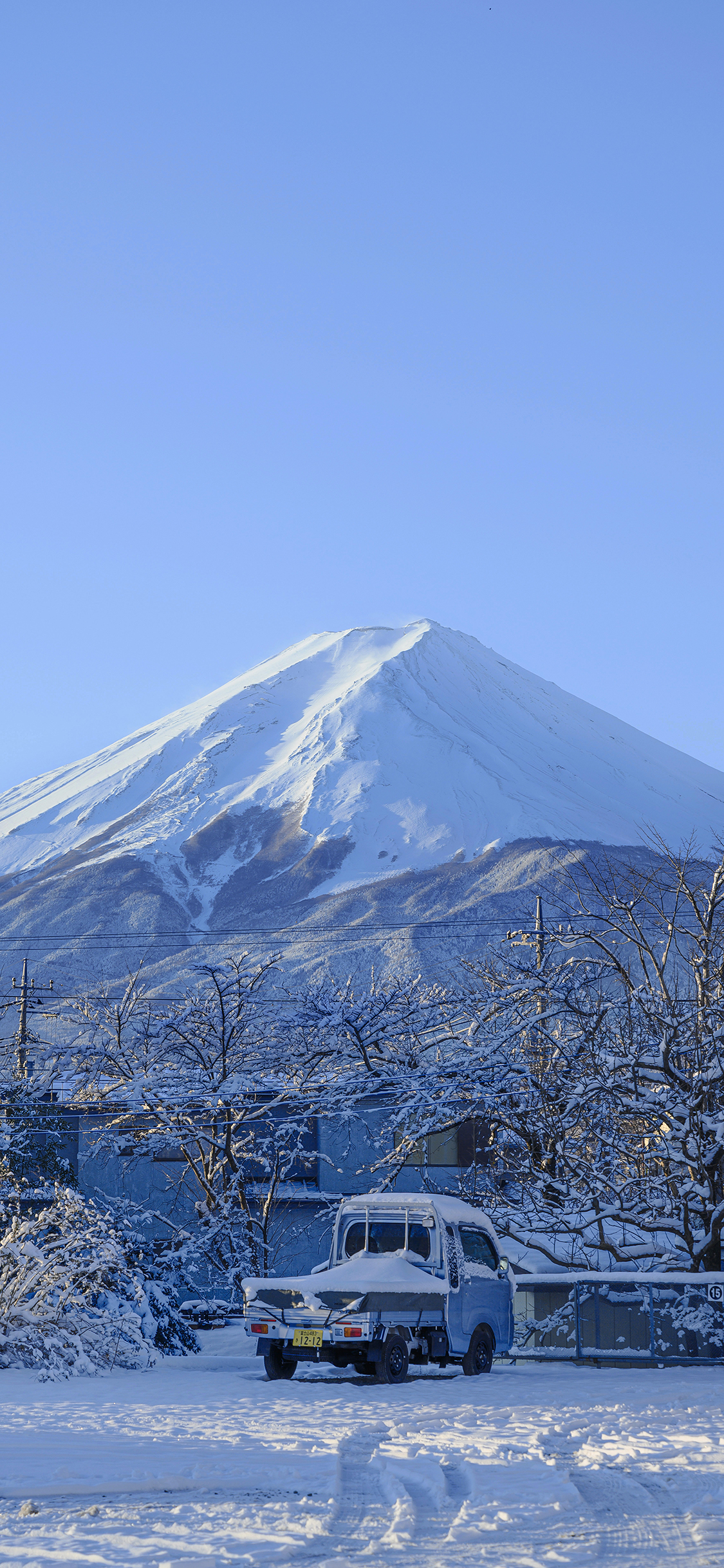 [2436×1125]雪山 雪地 冬季 寒冷 车辆 苹果手机壁纸图片