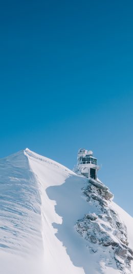 [2436x1125]雪峰 哨岗 蔚蓝 蓝天 苹果手机壁纸图片