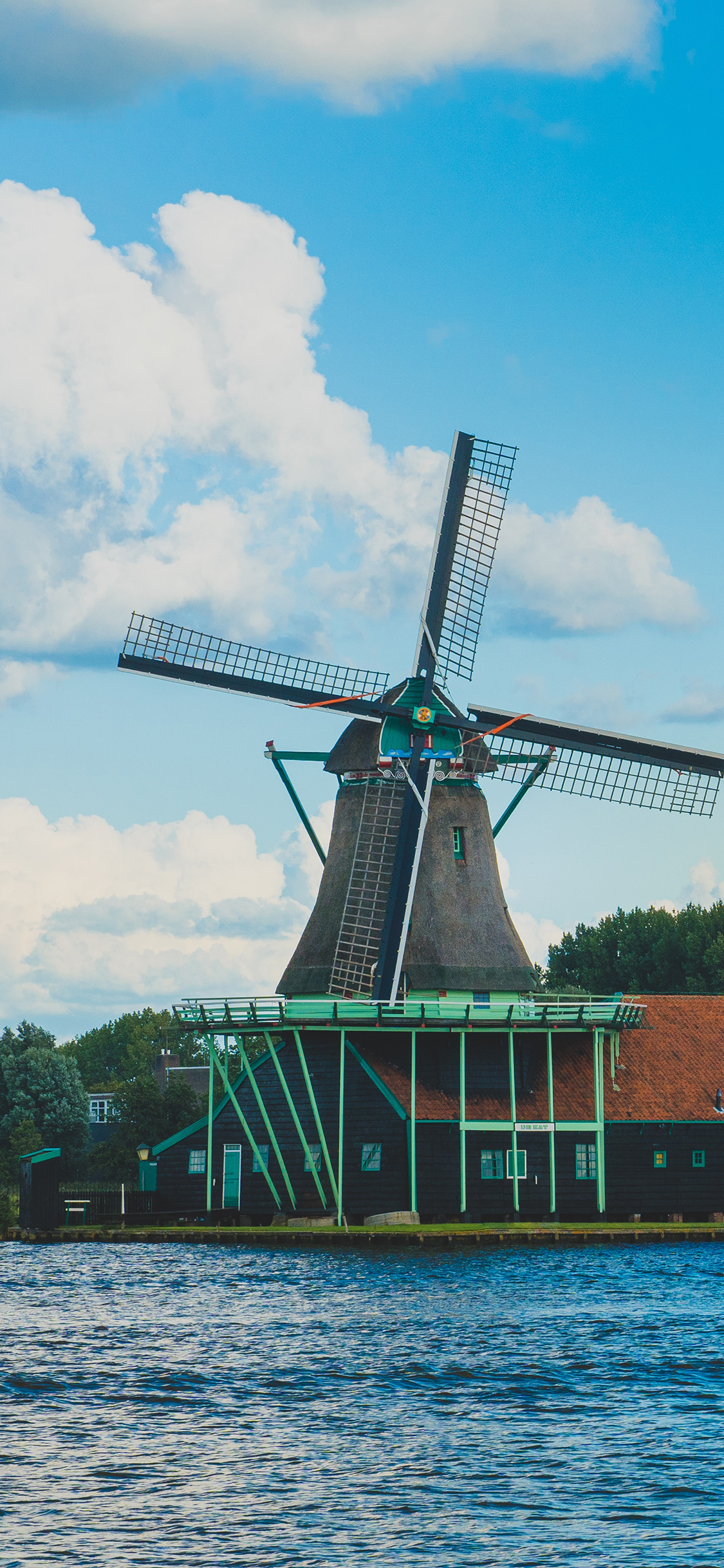 [2436×1125]风车 海边 天空 蔚蓝 苹果手机壁纸图片