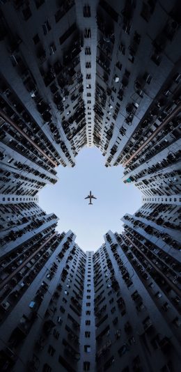 [2436x1125]飞机 建筑 城市 飞行 苹果手机壁纸图片