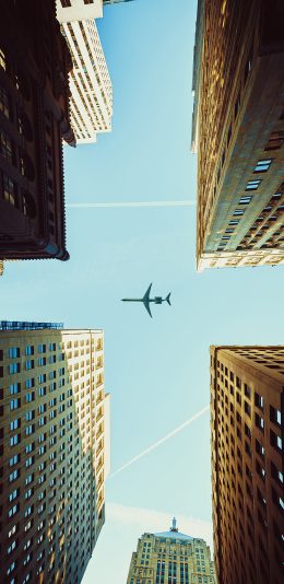 [2436x1125]飞机 飞行 航空 建筑 城市 苹果手机壁纸图片