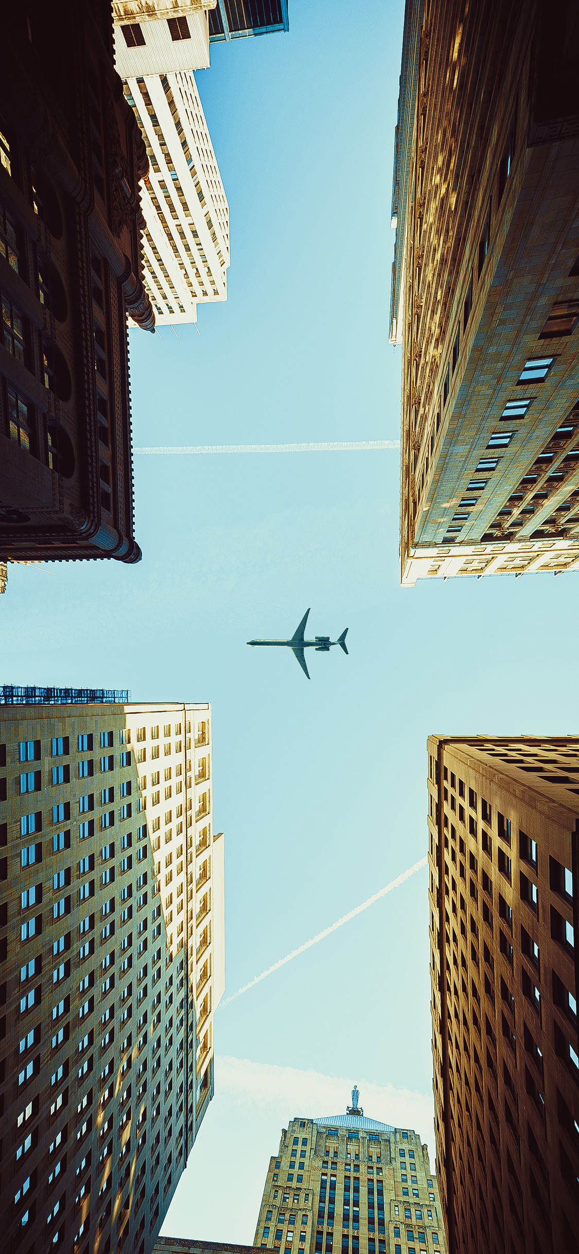 [2436×1125]飞机 飞行 航空 建筑 城市 苹果手机壁纸图片