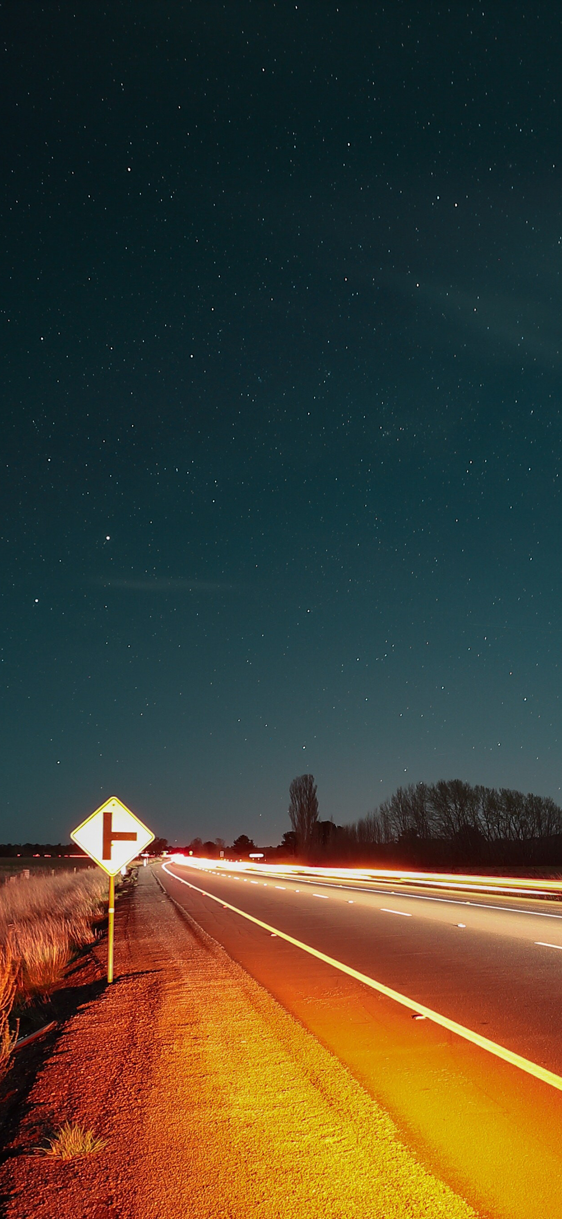 [2436×1125]马路 黑夜 灯光 道路 苹果手机壁纸图片