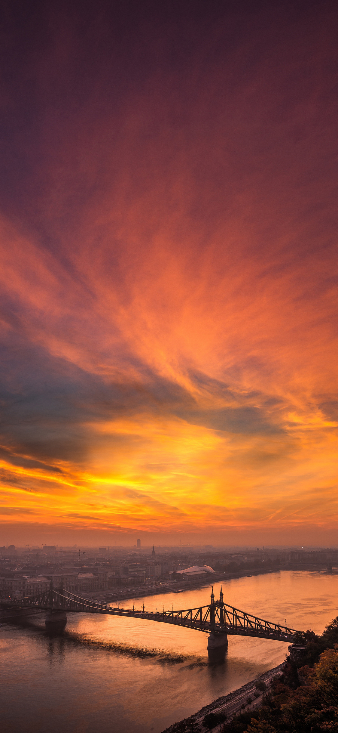 [2436×1125]黄昏 夕阳 日落 桥 城市 苹果手机壁纸图片